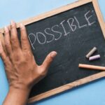Personal Development - a chalkboard with the word possible written on it